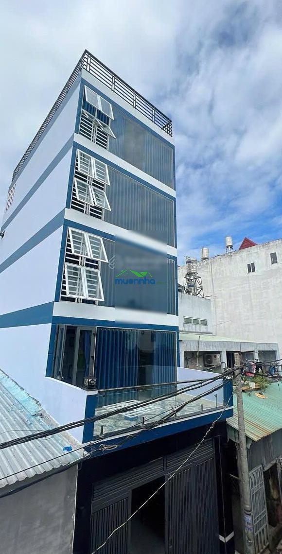 Bán nhà xây 1 trệt 4 lầu làm chdv đường lê trọng tấn - có 9 phòng - thu nhập 25tr - chỉ 6ty200