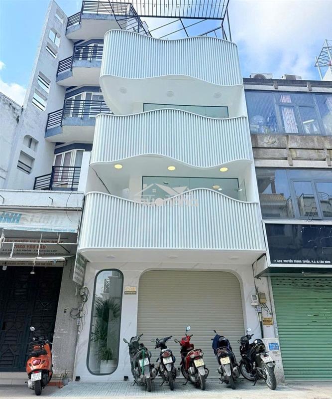 Nhà mới 100% 4 tầng dtsd 400m² nguyễn trọng tuyển tân bình