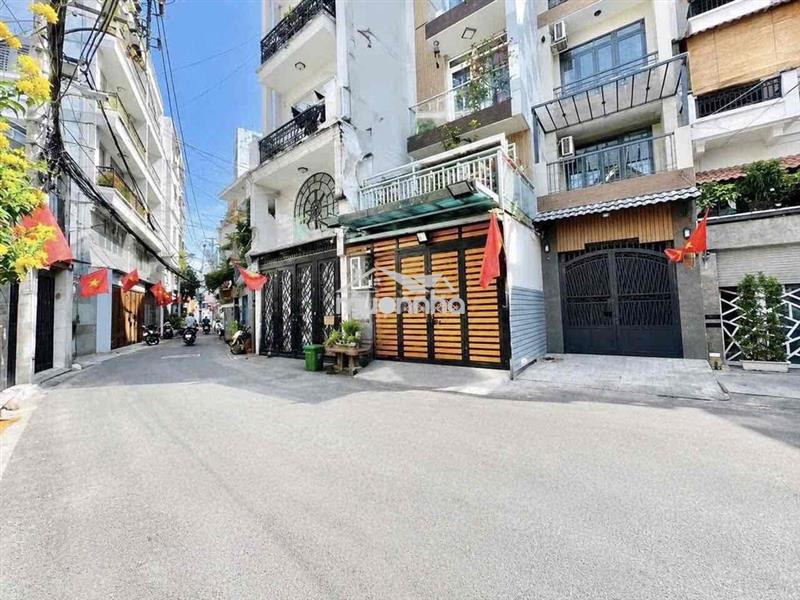 Cần bán nhà 4 lầu, 7 phòng, 6 tolet, hẻm xe hơi quay đầu, phú nhuận