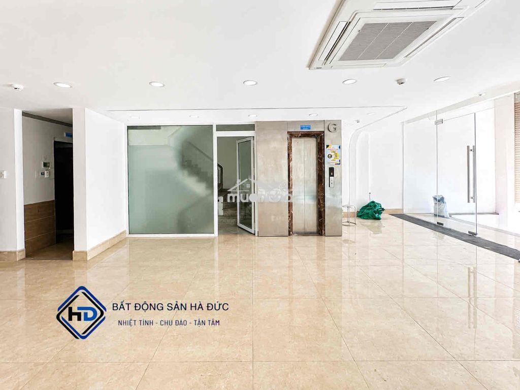 Toà nhà 8x20 có hầm để xe, thang máy gần trung tâm quận - Ảnh 2