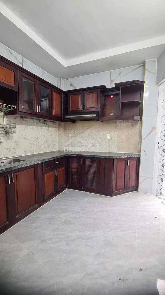 Nhà lầu 5 tầng 7p ngủ cách 3 căn ra mặt tiền phạm thế hiển p4 - Ảnh 4